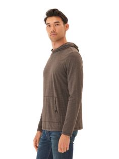 Made from our most popular jersey fabric, the eco-triblend, this long sleeve tee shirt pullover hoodie is the perfect year-round layering item to throw on over a tee or under a blazer. Solid Long Sleeve Tops With Kangaroo Pocket, Casual Long Sleeve Tops With Drawstring Hood, Athleisure Long Sleeve Top With Kangaroo Pocket, Outdoor Crew Neck Top With Kangaroo Pocket, Hooded Tops For Fall, Cotton Long Sleeve Tops With Kangaroo Pocket, Heather Athleisure Top For Fall, Athleisure Tops With Drawstring Hood For Layering, Casual Long Sleeve Sweatshirt With Brushed Fabric