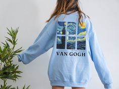 "This is the Van Gogh Starry Night Back Print Crewneck Sweatshirt. The soft, warm material is made from a blend of cotton and polyester. It has no itchy side seems and a trendy, loose fit. The cool design on this aesthetic crewneck is blank on the front and features Van Gogh's painting, \"The Starry Night,\" in a unique collage on the back. PLEASE SIZE UP 2-3 SIZES FOR A TRENDY, LOOSE FIT! This design is created by Jillian Anderson @ A Living Whimsy. She uses digital graphic design elements and Van Gogh Clothes, Van Gogh Sweater, Van Gogh Hoodie, Jillian Anderson, Indie Clothes Aesthetic, Painted Sweatshirt, فنسنت فان جوخ, Van Gogh Gifts, Gifts Aesthetic