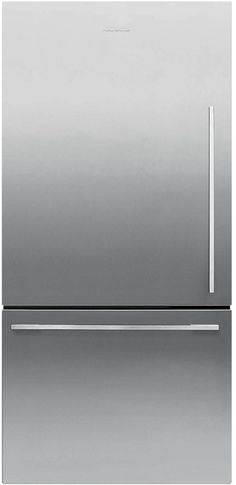 a silver refrigerator freezer sitting on top of a counter