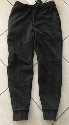 Black Bottoms With Comfort Waistband For Fall, Black Comfort Waistband Bottoms For Fall, Nike Bottoms With Pockets, Nike Joggers With Pockets For Fall, Nike Trousers With Side Pockets, Nike Full-length Bottoms With Pockets, Nike Sports Bottoms For Fall, Nike Long Bottoms With Pockets, Nike Trousers With Pockets