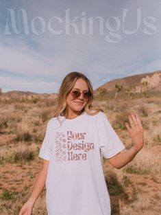 Part of our Joshua tree outdoor summer series, this is a front of shirt white Bella + Canvas 3001 mockup in white. Perfect for your boho and trendy designs! - WHAT YOU GET FROM US - This product is a digital file. You'll receive a ready-to-use JPG without watermarks. - THE FINE PRINT - - You may use this photo for personal & commercial use - You may not resell this file - Image is owned by MockingUs (all rights reserved) - ABOUT OUR SHOP - Our mockups are focused on creating a mood for your cust White Summer Shirt With Branding, Casual White Shirt With Branding, Summer White T-shirt With Branding, White Custom Print Shirt For Summer, White Branded T-shirt For Summer, White Custom Print Top For Summer, White Custom Print Shirt For Spring, White Shirt With Custom Print For Spring, Summer Graphic Tee With Branding