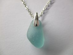 GENUINE SEA GLASS NECKLACE NATURAL UNENHANCED AQUA BLUE Nugget Gem Sea Glass measures 19mm x 11mm x 8mm. STERLING SILVER Chain and Bail. REAL SURF TUMBLED Found by me on a beautiful Greek beach. Comes in a lovely gift box. Thanks for visiting! Blue Glass Necklaces With Adjustable Chain, Light Blue Glass Jewelry For Gifts, Light Blue Glass Jewelry Gift, Light Blue Glass Jewelry For Gifting, Blue Nickel Free Necklace With Recycled Glass, Blue Recycled Glass Nickel-free Necklace, Greek Beach, Seaglass Jewelry, Sweet Necklace