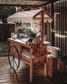 an outdoor food cart on a wooden deck