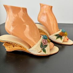 Fantastic 50s/60s wedges with a cut-out heel in Asian style. The instep band is made of raffia and is decorated with beaded flowers. Size US8 UK6 or EU39 Insole, measured inside the shoe 9.8"/25 cm Width across the widest part of the sole is 3.3"/8.3 cm Heel height 2.5"/6.5 cm The raffia has hardened a bit, but this has no effect when you wear the shoes. One of the outsoles is a little loose in the middle Before purchasing, please take a good look at all the pictures to see the condition this it Vintage Open Toe Wedge Sandals For Spring, Vintage High Heel Wedge Sandals For Spring, Vintage Open Toe Heels For Beach, Vintage Open Toe Heels For The Beach, Spring Vintage High Heel Wedge Sandals, Vintage Summer Wedge Sandals For Beach, Spring Vintage Wedge Heel Heels, Spring Vintage Wedge Heels, Vintage Wedge Heel Sandals For Spring