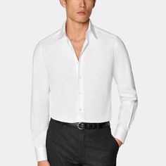 This crisp white button-up is tailored to a tailored fit and features a large point collar and single cuff-a classic style that's perfect for any formal look. Timeless Slim Fit Button-up Shirt, Formal White Custom Fit Shirt, Solid Slim Fit Formal Shirt, Smart Solid Color Dress Shirt For Office Wear, Tailored White Tops For Formal Occasions, White Tailored Top For Formal Occasions, Professional White Shirt For Office, Timeless Dress Shirt With Hidden Button Closure For Work, Timeless Dress Shirt With Hidden Button For Work