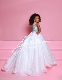 This Sugar Kayne C362 girls pageant dress features an elegant high neckline, a beautiful embellished bodice, and a princess waistline. Made with organza fabric, this dress is designed to make your little princess feel like royalty on stage. Perfect for any pageant or special occasion. Colors: Aqua/Multi, Pink/Multi, White/Multi Sizes: 2-16 Girls Pageant Dress, Girls Pageant Dresses, Pageant Dress, Organza Fabric, A Princess, High Neckline, Little Princess, On Stage, Long Skirt