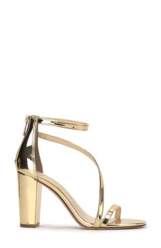 An asymmetric vamp strap creates modern dimension on a trend-savvy sandal lofted by a wrapped block heel. 3 1/2" heel Textile upper/synthetic lining/rubber sole Imported Modern Open Toe Sandals With 4-inch Heel, Gold Sandals With 4-inch Heel Medium Width, Modern Block Heels With Stacked Heel For Night Out, Gold Sandals With 4-inch Heel And Medium Width, Modern Block Heels With Wrapped Heel, Modern Heels With Wrapped Block Heel, Block Heel Sandals With Sculpted Heel For Night Out, Block Heel Sandals With Heel Strap For Night Out, Night Out Sandals With Sculpted Block Heel