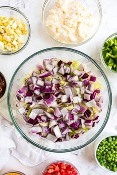 the ingredients for this salad include onions, carrots, celery, and peas