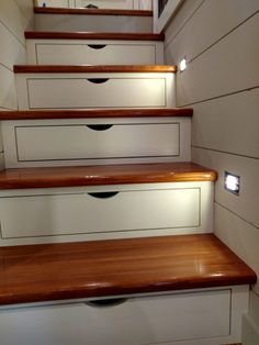 some drawers are sitting on the stairs