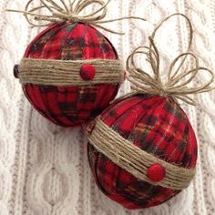 two red plaid christmas ornaments with burlocks and twine