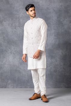 Ice grey Nehru jacket with embroidered motifs and front button placket.
Components: 1
Fabric: Pure Georgette
Neckline: Mandarin
Sleeve Length: Sleeveless
Color: Grey
Embroidered
Note: Inner kurta and pant worn by the model is not for sale - Aza Fashions Nehru Jacket For Men, Embroidered Motifs, Nehru Jacket, Nehru Jackets, Kurta With Pants, Jacket For Men, Jackets Online, Not For Sale, Gray Jacket