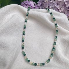 Malachite, Green Aventurine, Citrine, & Mother of Pearl necklace I call this beauty, the Bux necklace! 🤩 🎋you are purchasing 1 necklace  🎋high quality  🎋natural 4mm crystal beads 🎋2mm mother of Pearl beads 🎋roughly 15" 🎋black stainless steel end clasp & toggle 🎋handmade 🎋ready to ship Thank you for checking it out! IG & TT: @belsrealm Follow for latest updates! Aventurine Round Bead Jewelry For Meditation, Round Beads Aventurine Jewelry For Meditation, Round Beaded Aventurine Jewelry For Meditation, Meditation Jewelry With Round Aventurine Beads, Adjustable Green Beaded Necklace With 8mm Beads, Green Crystal Necklaces With Gemstone Beads As Gifts, Green Crystal Necklace With Gemstone Beads As A Gift, Green Beaded Agate Crystal Necklace, Green Gemstone Beads Crystal Necklace For Healing