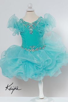 Elegant Light Blue Princess Dress For Pageant, Elegant Blue Princess Dress With Fitted Bodice, Elegant Light Blue Gown For Dress-up, Elegant Quinceanera Dresses With Rhinestones, Elegant Embellished Pageant Dress For Quinceanera, Elegant Embellished Quinceanera Pageant Dress, Elegant Blue Ball Gown For Pageants, Elegant Blue Princess Dress For Quinceanera, Elegant Organza Pageant Dress