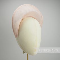 The shape of this season (and next's) has arrived! Halo crowns have stormed the millinery world and are the perfect step up from a chunky headband for a special occasion. Made from a double layer of high-quality stiffened natural sinamay, this shape has a domed front with a hollow underside, sinamay bias finished edges and tapered ends that sit nicely at the side of the head. You will need to fit a headband to this shape to make it functional, and our 5mm satin covered headbands do the job perfe Halo Crowns, Chunky Headband, Halo Band, Sinamay Fascinator, Halo Crown, Halo Headband, Hat Base, Crown Heights, Padded Headband