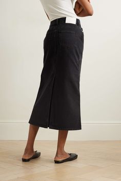 Find LOULOU STUDIO Net Sustain Rona Organic Denim Midi Skirt on Editorialist. LOULOU STUDIO's collections are packed with styles that you'll spot tastemakers wearing on the streets of Paris. Made from organic cotton, this denim skirt has a '90s-inspired midi length. Pair it with sneakers, knee boots or ballet flats. This product was created using Considered Materials. Find out more about NET SUSTAIN here. High Rise Denim Skirt For Work, High Rise Skirt For Fall Workwear, High Rise Skirt For Workwear, Fall Season, High-waist Denim Skirt For Work, Relaxed Fit High Waist Denim Skirt For Work, High Rise Relaxed Denim Skirt For Workwear, Denim Straight Leg Skirt For Work, Workwear Straight Leg Denim Skirt, High Waist Skirt With Relaxed Fit For Work