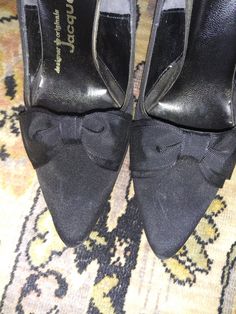 These are the most darling shoes I've seen in awhile. 1960s Jacqueline black silk pumps with perfect bow at opening! 3.5 inch spiked/stiletto heel offers a little sass to the elegance of these shoes. Size 6.5B they will arrive in their original box. Fitted Heels With Satin Bow And Round Toe, Fitted Satin Bow Heels With Round Toe, Classic Formal Heels With Bow, Round Toe Heels With Satin Bow For Evening, Fitted Closed Toe Heels With Satin Bow, Evening Heels With Satin Bow And Round Toe, Fitted Satin Bow Heels With Closed Toe, Pointed Toe Heels With Bow For Formal Occasion, Pointed Toe Heels With Bow For Cocktail