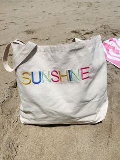 "large tote beach bag for all your summer trips! Canvas Size: 20\"W x 15\"H x 5\"D 23\" Handles Large bag fits up to 3 towels! Perfect for a family with kids. Custom wording available upon request" Summer Vacation Tote Canvas Bag, Summer Canvas Tote Bag For Beach Season, Sand Colored Tote Beach Bag, Sand-colored Tote Beach Bag For Beach Season, Sand-colored Tote Beach Bag, Summer Canvas Beach Tote Bag, Summer Canvas Tote Beach Bag, Canvas Beach Tote Bag For Vacation, Canvas Tote Beach Bag For Vacation