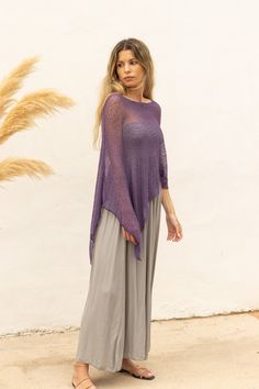 Eggplant purple sheer poncho to wear as a boho chic multiple way dress cover up. Perfect as an off the shoulder knitted poncho for a boheme style. Its simplicity and versatile design gives this poncho many possibilities, whether you want to wear it as a shawl, cape, scarf, dress cover up or even as shrug. The perfect accessory for spring days or those cool summer nights, adding a pop of color to a simple tank top and jeans outfit or even to a wedding garment. The poncho is made of soft, light an Cheap Women's Shawl Poncho, Boho Dress With Scarf, Lightweight Dress Cover Up, Luxury Chic Poncho For Spring, Poncho From Shawl, Scarf As A Poncho, Poncho Outfit Summer, Tank Top And Jeans Outfit, Top And Jeans Outfit