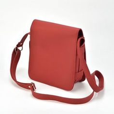 Take your essentials with you in style with our pink leather shoulder bag. It has an ideal size that allows you to keep more than your valuables. Crafted from original Cowhide leather, this shoulder bag is durable and a perfect fit for everyday use, as it is easy to carry. This leather shoulder bag has a sleek design. You can comfortably carry or wear it over your shoulder with its soft leather straps. This bag will keep your valuables safe at work or an event. So, what's holding you back? Enhan Casual Leather Flap Bag For On-the-go, Casual Leather Satchel Flap Bag, Casual Rectangular Shoulder Bag With Leather Lining, Leather Shoulder Flap Bag For Everyday Use, Soft Leather Shoulder Flap Bag, Everyday Soft Leather Flap Shoulder Bag, Everyday Soft Leather Shoulder Flap Bag, Casual Leather Flap Bag For Daily Use, Casual Leather Flap Shoulder Bag