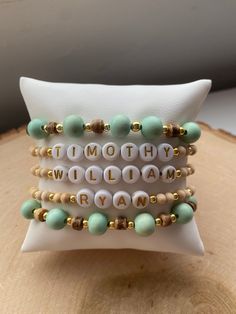 Our 5 stack MINT-TO-BE boho stack! These are super stylish, comfortable and perfect for daily wear! Such a chic boho-look! (These are meant to fit snug. If you would like them to feel loose and move around on your wrist, please size up). Each bracelet is carefully handmade with high quality materials: -8mm natural wood beads (mint color) -4mm natural wood beads -natural wood heishi beads -3mm gold hematite beads -7mm white/gold acrylic letters (other color options available- see pic) -Cord: high Everyday Personalized Bohemian Friendship Bracelets, Adjustable Green Beaded Bracelets For Personalized Gift, Adjustable Green Beaded Bracelets For Gifts, Everyday Bohemian Personalized Beaded Bracelets, Everyday Personalized Bohemian Bracelets, Customizable Green Bracelet For Personalized Gift, Bohemian Personalized Green Bracelets, Personalized Green Bohemian Bracelets, Bohemian Personalized Name Bracelet As Gift