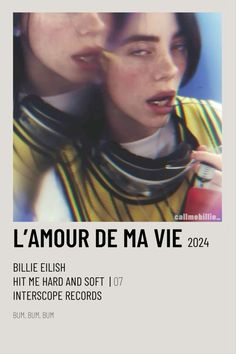 two people with their mouths open in front of a poster that says l'amour de ma vie