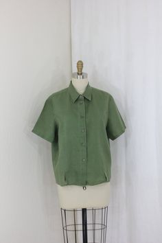 "Shirt collar linen button up blouse, short sleeves. Measurements: shoulder:  18\" bust:  47\" waist:  45\" hips:  47\" sleeves:  8.25\" length top of shoulders to hem:  24\" label:  Marco Pecci size:  44 material:  pure linen/flax linen Excellent vintage condition, washed and ready to wear. Please take time to review our shop policies before  finalizing your purchase     v101038" Collared Blouse, Green Shirt, Collar Blouse, Pure Linen, Shirt Collar, Forest Green, Womens Clothing Tops, Ready To Wear, Short Sleeves