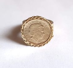 Beautiful solid gold antique queen Elizabeth coin ring, vintage-style big round boho jewelry for women, available in 9k or 14k yellow gold.  This ring was handcrafted using a British 5p coin decorated with braided solid gold wires and attached to a wide handmade band. It is available in 9k or 14k solid yellow gold.  The statement ring is delicate and unique, with a charmingly romantic and vintage touch. Its elegant design will enhance the beauty of any outfit you wear. Indulge in the beauty of t Signet Ring Women, Gold Coin Ring, Signet Rings Women, Antique Style Rings, Antique Jewelry Rings, Romantic Jewelry, Romantic Jewellery, Coin Ring, Ring Antique