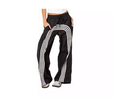 Women's Wilda striped nylon track pants - Macy's Sporty Spring Activewear With Side Stripes, Sporty Sweatpants With Side Stripes For Spring, Athleisure Wide Leg Sweatpants With Side Stripes, Spring Sportswear Sweatpants With Side Stripes, Spring Sports Pants With Side Stripes, Sporty Pants For Spring Sports, Sporty Pants For Sports In Spring, Casual Spring Joggers With Side Stripes, Sporty Wide Leg Spring Joggers