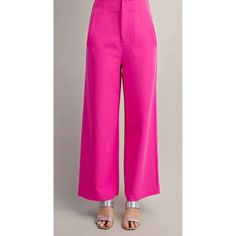 High Waisted Wide Leg Dress Pants - Pink Upgrade your work wardrobe with these stylish and versatile high waisted wide leg dress pants. The beautiful pink color adds a pop of femininity to your outfit, while the flat side pockets and front zipper provide a sleek and modern look. These pants are designed with a high waist to flatter your figure and elongate your legs, making you feel confident and sophisticated. The absence of pleats adds to the clean and polished appearance of these pants. Perfect for any occasion, these dress pants will become a staple in your closet. Shop now at RockinSassBoutique.shop! Spring Party Wide-leg Dress Pants, Chic Spring Wide Leg Pants Solid Color, Elegant Pink Office Bottoms, Pink Ankle-length Office Pants, Spring Dress Pants In Solid Color With Wide Leg, Spring Dress Pants With Solid Color And Wide Leg, Elegant Pink Ankle-length Pants, Pink High-waisted Wide Leg Summer Pants, Spring Solid Color Wide Leg Office Pants