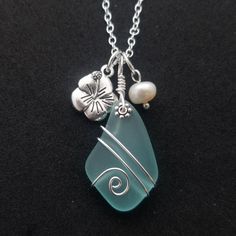 Aloha! These design shows my love for this beautiful island of Hawaii. This item will be made to order and shipped directly from Hawaii. This is a sea glass pendant with a tarnish resistance silver plated chain necklace.The chain is a 20 inches long (can be customized from 30 inch down to any length if you leave a note with your order) with a lobster claw catch. Free gift wrap and gift message with every order. Perfect for you or as gift to family members or friends. Please see my other items in Bohemian Sea Glass Jewelry For Jewelry Making, Ocean-inspired Sea Glass Jewelry For Jewelry Making, Turquoise Sea Glass Jewelry For Beach, Turquoise Sea Glass Ocean-inspired Jewelry, Ocean-inspired Turquoise Sea Glass Jewelry, Turquoise Wire Wrapped Sea Glass Jewelry, Turquoise Sea Glass Wire Wrapped Jewelry, Seaglass Jewelry, Wire Wrapped Stone Jewelry