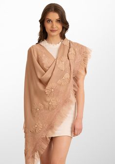 Indulge in the ultimate opulence with this fawn scarf woven from the finest cashmere. Wrap yourself in this statement piece elevated by its handcrafted tonal pearl-embroidered daisy flowers, exotic lavender lace panels and an fawn frill detailing on one side. This scarf brings with it a sense of timeless beauty, perfectly blending luxurious warmth and refined elegance. It is the ideal accessory to make heads turn on any formal evening out or a special occasion. Elegant Cashmere Shawl Scarf, Elegant Beige Wool Scarf, Elegant Cashmere Shawl, Luxury Beige Scarf For Formal Occasions, Luxury Beige Formal Scarf, Elegant Beige Dupatta With Floral Embroidery, Elegant Winter Wedding Pashmina Shawl, Elegant Cream Pashmina Shawl, Luxury Pashmina Shawl For Formal Occasions