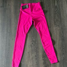 Fuschia Pink, Never Worn Nike Lux Leggings. Tight Fit, Mid-Rise Dry-Fit Pink Snug Fit Athleisure Bottoms, Pink Fitted Sporty Bottoms, Pink Snug Fit Sporty Bottoms, Sporty Pink Snug Fit Bottoms, Stretch Nike Yoga Pants, Sporty Snug Fit Pink Bottoms, Nike Full Length Yoga Bottoms, Nike Elastane Yoga Bottoms, Nike Full Length Workout Leggings