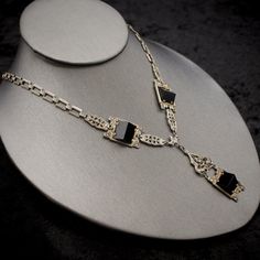 "Fine Antique Art Deco 925 Sterling Silver + Onyx + Marcasite Lavalier Pyramid Necklace- Authentic Jewelry of the 1920s Measurements: Chain: 18.5\" + 2 1/8\" (lavalier pendant) Display bust is not life size, so compare chain length (above) with a necklace in the personal collection of the recipient or yourself in order to be sure how the piece will lay on the wearer. Excellent antique condition, no missing stones. Reference photos provided for you to verify condition. Disclaimer on multiple purc Art Deco Pendant Necklace For Formal Occasions, Art Deco Sterling Silver Filigree Jewelry, Victorian White Gold Necklaces For Evening, Antique White Gold Evening Jewelry, Art Deco White Gold Necklace For Evening, Victorian White Gold Necklace For Evening, Art Deco Evening Gemstone Jewelry, Victorian Style White Gold Necklace For Evening, Antique Jewelry With Polished Finish For Evening