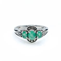 Sterling Silver Natural Emerald Three Stone Ring Size 5. This Platinum plated Sterling Silver ring features three oval cut natural green Emeralds in a three stone design. Complete with comfort fit bottom, this ring will make a special gift. Emeralds symbolize love and truth and they are also the May Birthstone.  Ring is pre-owned and in great condition. Buy with confidence knowing that all our jewelry items are exactly as described. All precious metals are tested and are guaranteed with the Ther Green Emerald Three-stone Birthstone Ring, Green Three Stone Emerald Promise Ring, Fine Jewelry Green Three-stone Rings, Green Emerald Three Stone Ring For Anniversary, Green Three-stone Emerald Ring For Anniversary, Green Three Stone Emerald Ring For Anniversary, Classic Oval Three-stone Emerald Ring, Classic Oval Emerald Ring With Three Stones, Silver Three-stone Emerald Ring