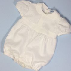 Linen Christening romper. Adorable white linen romper for boy. Lined bodice and romper. Perfect for Christening, Baptism, Wedding or any other special occassion. Front bodice with pin-tucks and waist detail. Short puffed sleeves. Peter pan collar...ric-rac trim to collar and waist. Button closure. Button closure to crutch for easy nappy/diaper changing. 6-12m Chest...29cm Length from shoulder to crutch...40cm 12-18m Chest...30.5cm Length from shoulder to crutch...42cm 18-24m Chest...33cm Length Cotton Bubble Romper With Short Sleeves For Baptism, Off White Baptism Dress For Summer, Cotton Bubble Romper For Baptism In Summer, Cream Short Sleeve Bubble Romper For Summer, White Short Sleeve Bubble Romper For Baptism, White Short Sleeve Bubble Romper For Summer, Spring Baptism Cream Bubble Romper, White Bubble Romper For Baptism In Summer, White Bubble Romper For Baptism