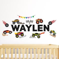 a baby's name wall decal with cars on it