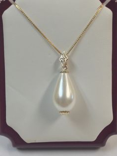 "SOLID 14KT YELLOW GOLD PENDANT SOUTH SEA SHELL PEARL IS  18x10 mm  NATURAL DIAMOND IS 0.01 TCW PENDANT LENGTH IS 1\" INCH 925 STERLING SILVER CHAIN WITH GOLD PLATED IS 18\" INCHES (FREE) WITH GIFT BOX" Exquisite Teardrop Gold Necklace, Fine Jewelry Drop Earrings With High Luster, Teardrop Yellow Gold Jewelry With Diamond Accents, Elegant Gold High Luster Jewelry, Elegant High Luster Gold Jewelry, Gold Drop Jewelry With High Luster, Teardrop Yellow Gold Jewelry With High Luster, White Gold Drop Earrings With High Luster, White Gold Drop Jewelry With High Luster