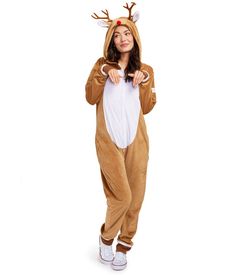 a woman in a reindeer costume is standing with her hands on her hips and looking at the camera