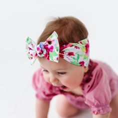 The PRINTED KNOT collection includes beautiful florals and modern patterns that will keep your babe the playground trendsetter. DETAILS: Limited seams on the headband means maximum stretch for ultimate comfort. Visible stitching adds detail and protects the integrity of the fabric; no holes were cut to turn the seams in. Add a printed bow to any outfit to showcase your strong sense of style. Novelty prints are sweet reminders of all your favorite memories. All prints are limited quantity, so gra Adjustable Multicolor Headband For Spring, Adjustable Flower Headband For Summer, Casual Summer Headband With Elastic Band, Summer Adjustable Elastic Hair Accessories, Adjustable Elastic Headband For Spring, White Elastic Headband For Summer, Adjustable Cotton Headband With Elastic Band, Casual Cotton Headband With Elastic Band, White Casual Hair Accessories For Summer