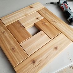 the unfinished wood frame is ready to be cut into smaller square pieces with a drill