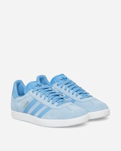 Blue Low-top Sneakers With Three Stripes, Blue Sneakers With Three Stripes Branding, Blue Low-top Sneakers With Three Stripes Branding, Adidas Blue Sneakers With Three Stripes, Adidas Blue Sporty Skate Shoes, Blue Skate Shoes With Three Stripes And Round Toe, Blue Three Stripes Skate Shoes With Round Toe, Blue Skate Shoes With Three Stripes For Streetwear, Blue Lace-up Adidas Skate Shoes