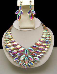 AS IS Dazzling AB Rhinestone Bib Necklace Dangle Adjustable Clip on Earrings Set Silver Tone - Etsy Multicolor Crystal Jewelry With Sparkling Stones, Crystal Rhinestone Dangle Necklace With Bling, Crystal Rhinestone Dangle Jewelry, Party Jewelry Sets With Rhinestones And Dangle Shape, Crystal Dangle Jewelry With Rhinestones, Party Jewelry Sets With Dangle Rhinestones, Sparkling Crystal Costume Jewelry, Jeweled Crystal Dangle Jewelry, Crystal Jeweled Dangle Jewelry