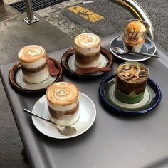 there are four different desserts on the tray