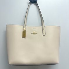 Selling A Light Beige Large Coach Tote Bag. Perfect For Work, School Or Vacation. Has A Beautiful Dark Blue Interior With Gold Accents. Luxury Beige Bags For Everyday Use, Luxury Beige Bag For Everyday Use, Luxury Beige Tote Shoulder Bag, Formal Beige Tote Shoulder Bag, Luxury Cream Tote Bag, Luxury Cream Rectangular Bag, Beige Rectangular Bags With Gold-tone Hardware, Luxury Cream Shoulder Bag For Shopping, Elegant Satchel With Dust Bag For Errands