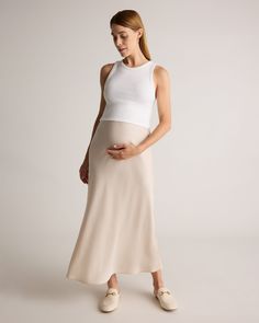 The Washable Stretch Silk Maternity Skirt offers elegance and comfort for expectant mothers. Crafted from luxurious stretch silk, it provides a flattering fit that adapts to your growing bump. Easy to care for and perfect for both casual and formal occasions, this skirt combines style with practicality. Pregnancy Photos, Fashion Outfits