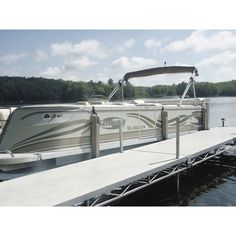 a boat is docked at the end of a pier