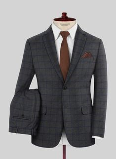 Create lasting memories with your loved ones by wearing our Italian Jamen Gray Checks Flannel Suit. This suit isn't just about style; it's about crafting unforgettable moments that you'll cherish forever. Crafted from pure wool with a mesmerizing plaid pattern, it keeps you feeling fresh all day. Whether you're dancing the night away or sharing a few laughs with friends, this will add a touch of excitement to any gathering. So, suit up and let the good times roll!  Look features a 2 button jacke Plaid Wool Suit With Notch Lapel, Semi-formal Plaid Wool Suits, Plaid Suits For Business Casual In Winter, Timeless Fitted Suits For Fall, Timeless Fitted Suit For Fall, Timeless Fitted Fall Suits, Fitted Tweed Jacket In Suiting Fabric For Fall, Classic Plaid Suits For Winter, Bespoke Tailored Suits For Fall