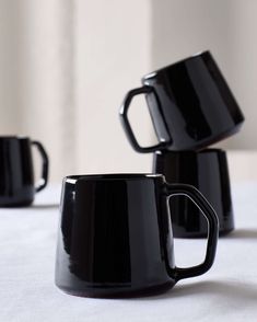 Modern, black Riad Mugs handcrafted in Morocco by master ceramists. Part of the Riad Dinnerware collection by Fairkind. Black Metal Coffee Mug, Black Riffle Coffee Mug, Black Coffee Mug 6oz, Target Black Coffee Mugs, Black Over Size Mug, Matte Mugs, Modern Mugs, Black Mugs, Thrown Pottery