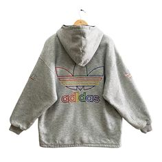 Vintage 90s Adidas Trefoil Rainbow Grey Hoodie Sweatshirt Size Medium Adidas Three Stripes Crewneck Adidas Sweater Pullover Embroidered Logo by brixtonclothing on Etsy Adidas Gold, 90s Adidas, Adidas Three Stripes, Adidas Sweater, Adidas Trefoil, Fun Sweatshirts, Sweater Pullover, Grey Hoodie, Used Clothing