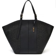 From Ldt, The Tatum Large Black Leather And Straw Panel Tote Bag Features: Pp/Cotton Straw And Nappa Leather Gold-Plated Hardware Inside Zippered Closure 2 Open Media Pockets Adjustable Double Shoulder Straps Approx. 22" L At The Top, 11.5" L At The Base X 14" H X 7" W Imported. Chic Evening Bags With Leather Trim, Evening Tote Bag With Leather Trim, Black Shoulder Bag With Leather Trim, Black Shoulder Bag With Leather Trim For Daily Use, Black Shoulder Bag With Leather Trim For Errands, Black Leather Trim Shoulder Bag For Shopping, Black Evening Bags With Leather Trim, Chic Black Bag With Leather Trim, Elegant Black Shoulder Bag With Leather Trim